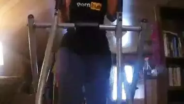 Horny South Indian girl shows off her big ass while working out