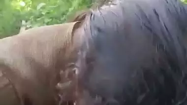 Desi Tamil lady gives an Indian blowjob in the jungle