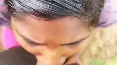 Horny village girl gives a blowjob outdoors in desi porn