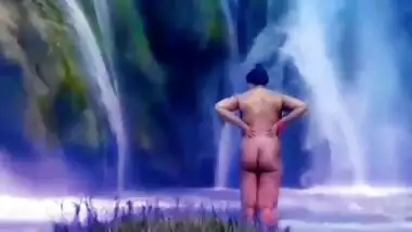 Desi publicly nude in front of water fall.