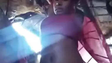 Indian girl looks into the sex camera posing with naked XXX boobies