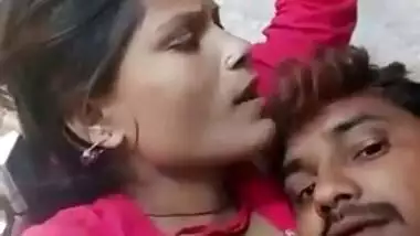 Young Desi woman is lying in bed with XXX lover kissing her on camera