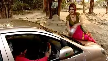 Indian bhabhi outdoor car wash & displaying deep cleavage