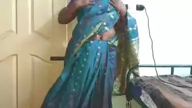 desi indian tamil telugu kannada malayalam hindi horny cheating wife vanitha wearing blue colour saree showing big boobs and shaved pussy press hard b