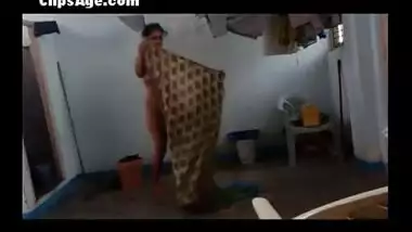 Step mom caught nude at home using hidden cam