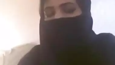 Pretty Desi beauty in hijab demonstrates massive XXX jugs on camera