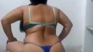 Fatty Indian woman wearing black mask demonstrates porn skills