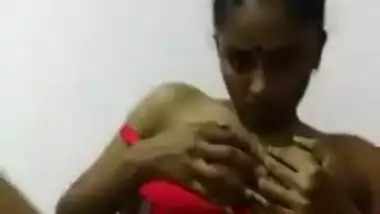 Sexy Indian girl pulls sex red lingerie down to flash her XXX titties