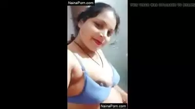 Horny desi bhabhi sucking her boobs