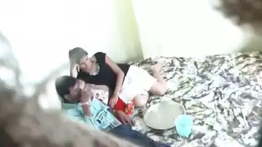 mature pune couple lying with her boobies exposed