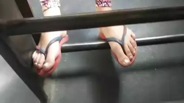 Teen girl feet on public bus