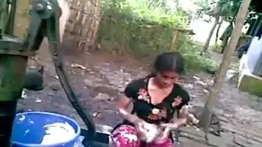 village girl bathing outdoor and took a self