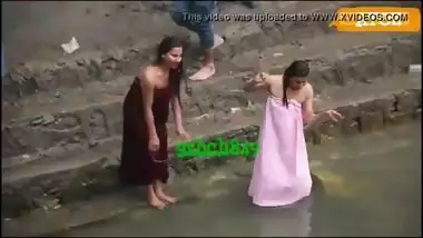 Indian village girls having a public bath