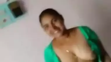 Boy is lying in bed filming Desi slut who bares her XXX tits for him