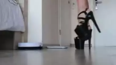 toned student dressed in high heels and shows...