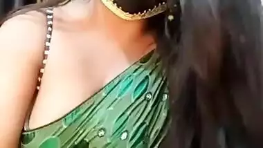 Young desi Bhabhi in saree milking her tits