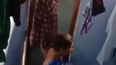 Amateur voyeur XXX camera catches sexy Desi babe taking a shower