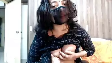 Desi cam girl opens checkered shirt to expose perky tits to XXX fans