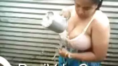 Hot aunty bathing outdoor