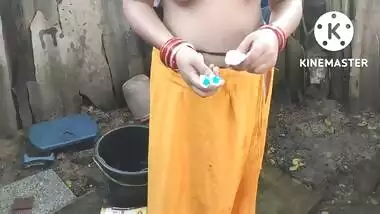 Anita yadav bathing outside with hot