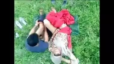 Green grass is perfect for Indian couple to practice porn action on it