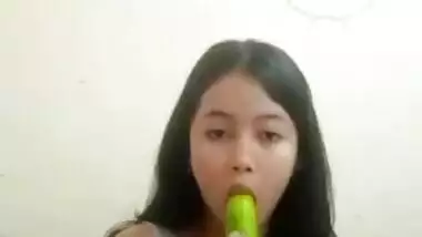 Horny Teen With Cucumber