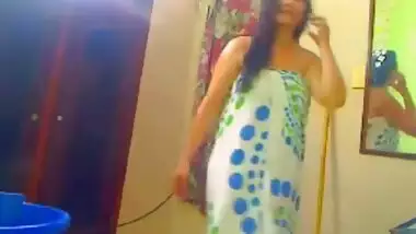 Busty Desi babe showing awesome tits while...