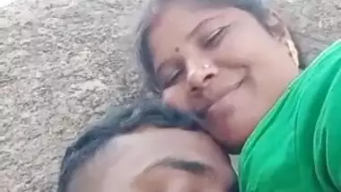 Sucking big boobs of Bhabhi outdoors on cam