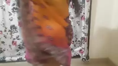 Desi Hot Bhabhi Getting Ready For Beach Wearing Bikini Inside Her Dress