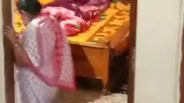 Aunty caught on hidden cam while dressing video