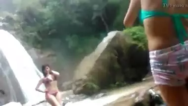 Indian bikini girls having fun in the waterfalls