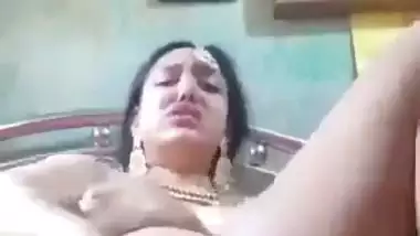 Newly married nude desi lady fucks her pussy with a banana