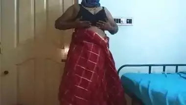 desi indian tamil telugu kannada malayalam hindi horny cheating wife vanitha wearing cherry red colour saree showing big boobs and shaved pussy press