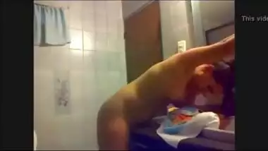 Hidden cam catches 18yo Desi girl satisfying her pussy in washroom