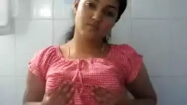 Cute girl playing in bathroom