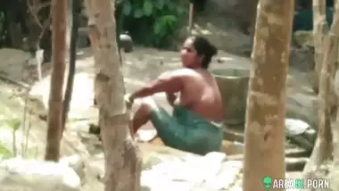 Indian busty aunty taking bath outdoor full nude, caught hidden cam