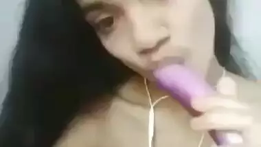 Skinny Desi girl masturbating pussy with brinjal