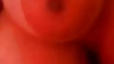 Playing with big round Indian desi boob