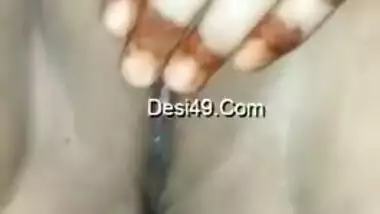 Indian aunty with tattooed hand touches XXX hollow called a vagina