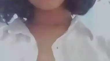 Girl opening shirt and round big boobs shown