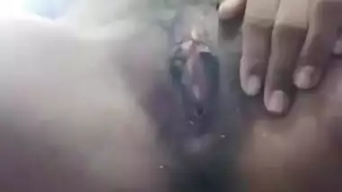 Horny teen Desi girl fingering naked pussy