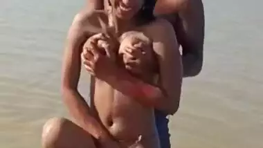 Enjoying with busty Desi slut in river