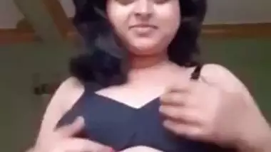 Beautiful horny Bengali Desi babe fingering her boobs and pussy XXX