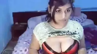 Big breasted Roshnie masturbating fucking her...