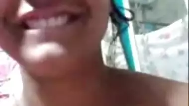 Smiling beautiful girl topless on video call