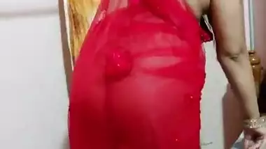 Sexy Bhabhi in See through Red Saree without blouse Exposing Boobs